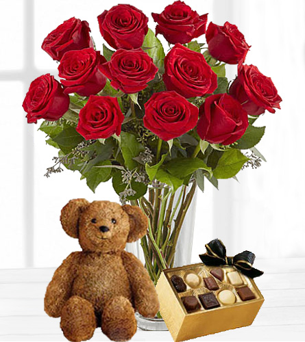 The Ultimate Valentine's Gift - Twelve Vased Red Roses with Chocolates & Bear